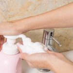 Washing hands with foam soap